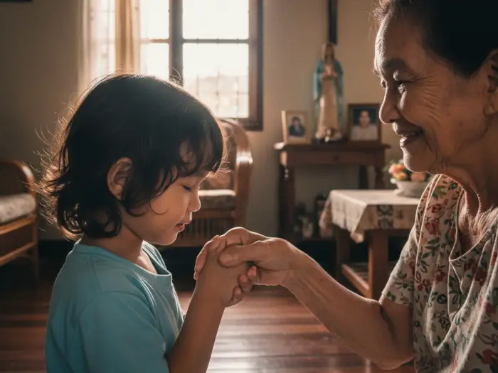 Filipino child doing mano po gesture to elder as tradition of respect and Filipino Customs.