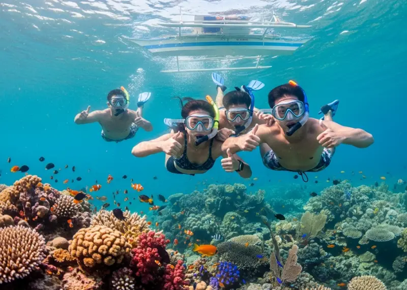 Friends snorkeling together at Siete Pecados Marine Park surrounded by corals and fish.