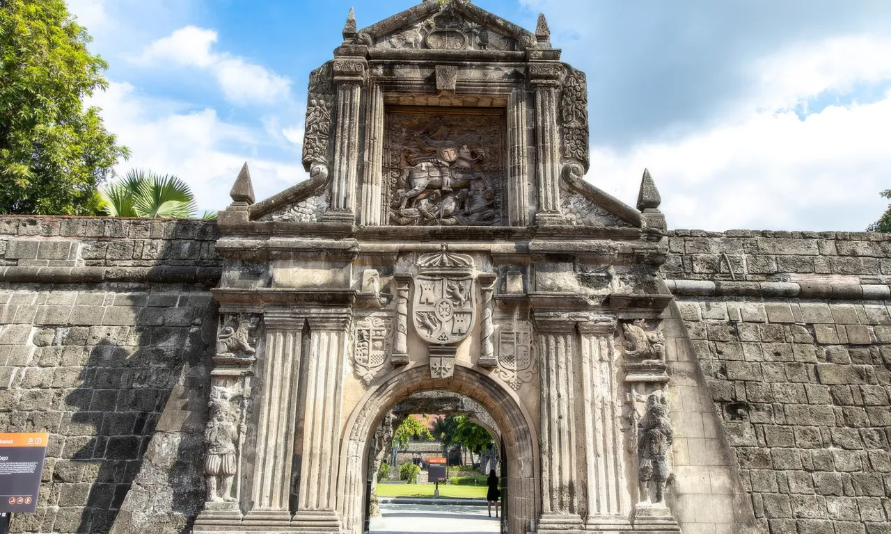 A person standing at a crossroads surrounded by ghostly images of various unsolved mysteries, representing the greatest unsolved mysteries in the Philippines.
