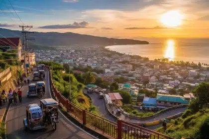 Pagadian City, Philippines, showcasing its steep hillside streets with the iconic inclined tricycles climbing up.
