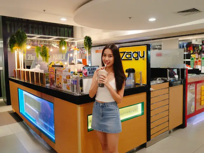 Zagu pearl shakes franchise booth serving fruit and milk tea drinks