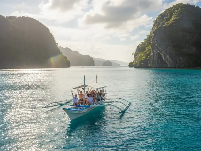 Calm seas and sunshine during a perfect island-hopping day in El Nido Palawan.