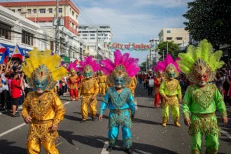 Colorful masked dancers perform during the MassKara Festival street parade in Bacolod City.